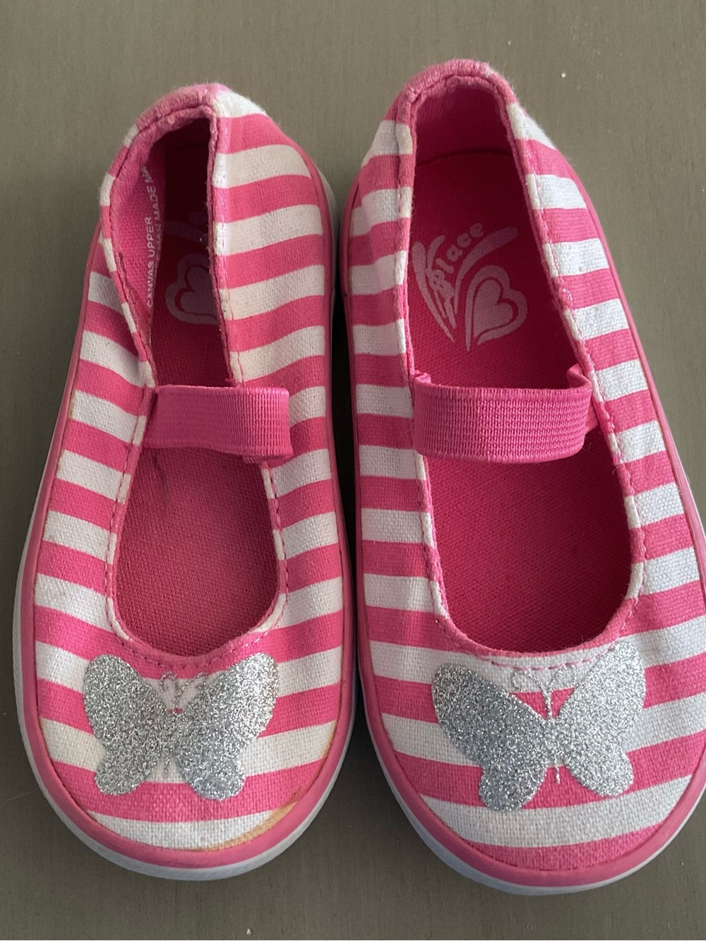 Place Pink and White Striped Mary Jane Shoes with Silver Butterfly